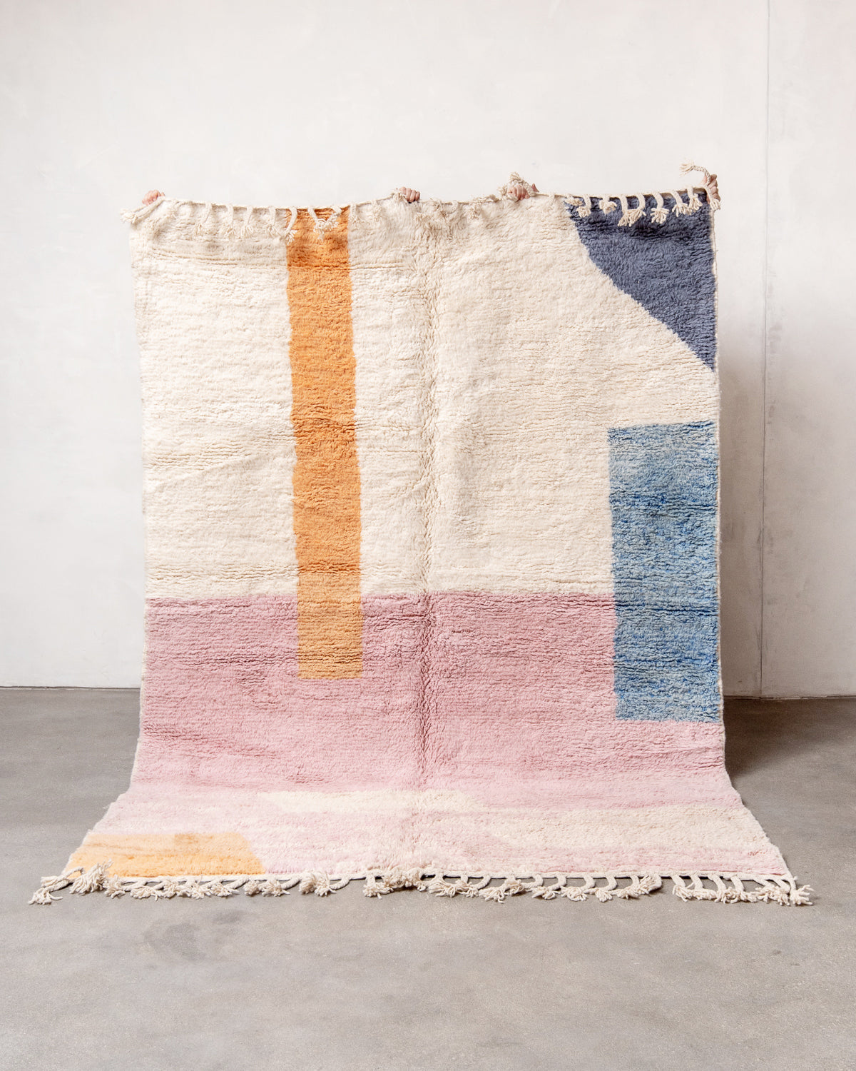 Modern, designer, handcrafted Berber rug from Morocco. Beniourain carpet with beautiful colours and patterns and fluffy wool texture.